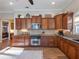 Spacious kitchen with granite countertops and ample cabinetry at 4248 Hog Mountain Rd, Hoschton, GA 30548