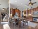 Island kitchen features granite countertops and breakfast bar at 4248 Hog Mountain Rd, Hoschton, GA 30548