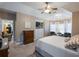 Main bedroom with built-in shelving and sitting area at 4248 Hog Mountain Rd, Hoschton, GA 30548