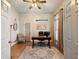 Home office with hardwood floors and large windows at 4248 Hog Mountain Rd, Hoschton, GA 30548