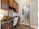 Home office with built-in desk and wine storage at 4248 Hog Mountain Rd, Hoschton, GA 30548