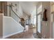 Impressive staircase with wrought iron railing at 4248 Hog Mountain Rd, Hoschton, GA 30548