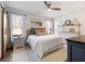 Main bedroom with a cozy atmosphere and plenty of natural light at 4258 Hog Mountain Rd, Hoschton, GA 30548