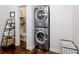 Stackable washer and dryer in a dedicated laundry room at 4258 Hog Mountain Rd, Hoschton, GA 30548