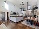 Bright and airy living room with high ceilings and a spiral staircase at 4258 Hog Mountain Rd, Hoschton, GA 30548