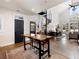 Open living area with spiral staircase, high ceilings, and modern farmhouse decor at 4258 Hog Mountain Rd, Hoschton, GA 30548