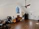 Versatile loft area with hardwood floors, and a ceiling fan at 4258 Hog Mountain Rd, Hoschton, GA 30548
