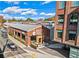 Exterior view of Krog Street Market, showing its brick building and outdoor seating area at 22 Airline Ne St # 106, Atlanta, GA 30312