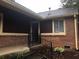 Brick ranch home with a covered entry and small front yard at 33 Country Place Ct, Alpharetta, GA 30005