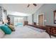 Spacious primary bedroom with a large bed, window, and ample natural light at 4905 Clearstone Nw Way, Acworth, GA 30101