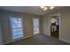 Bright dining room with view to kitchen and access to deck at 227 Camp Creek Sw Rd, Lilburn, GA 30047