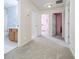 Spacious hallway with access to bedrooms and bathroom at 5720 Millstone Dr, Cumming, GA 30028