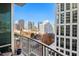 Balcony with city views and seating for two at 943 Peachtree Ne St # 809, Atlanta, GA 30309