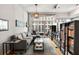 Modern living room with large windows and built-in shelving at 943 Peachtree Ne St # 809, Atlanta, GA 30309