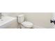 Simple bathroom with floating sink and toilet at 152 Palm St, Holly Springs, GA 30115