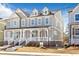Two-story craftsman style home with front porch at 152 Palm St, Holly Springs, GA 30115