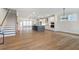 Open concept kitchen with island and stainless steel appliances at 152 Palm St, Holly Springs, GA 30115