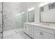 Spa-like bathroom with marble shower and double vanity at 734 Stickley Oak Way, Woodstock, GA 30189