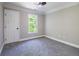 Bright bedroom with gray carpet and ceiling fan at 2453 Paul Nw Ave, Atlanta, GA 30318