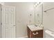 Simple bathroom, includes a vanity and toilet at 6057 Hemperly Rd, Atlanta, GA 30349