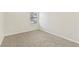 Bright bedroom featuring neutral walls and carpet at 6057 Hemperly Rd, Atlanta, GA 30349