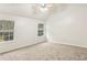 Large bedroom with vaulted ceiling and ceiling fan at 6057 Hemperly Rd, Atlanta, GA 30349