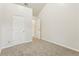 Well-lit bedroom with neutral walls and carpet at 6057 Hemperly Rd, Atlanta, GA 30349