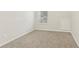 Bright bedroom with neutral carpeting at 6057 Hemperly Rd, Atlanta, GA 30349