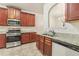 Kitchen with granite countertops and stainless steel appliances at 6057 Hemperly Rd, Atlanta, GA 30349