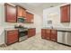 Spacious kitchen, granite counters, and ample cabinetry at 6057 Hemperly Rd, Atlanta, GA 30349