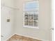 Laundry room with built-in shelving and window at 6057 Hemperly Rd, Atlanta, GA 30349