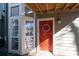 Red front door and sidelight window at 1110 Riverview Se Dr, Marietta, GA 30067