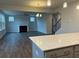 Modern kitchen with gray cabinets, quartz countertops, and a large island at 23 Rockberry Ct, Dallas, GA 30157