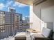 Relaxing balcony with city views and comfortable seating at 325 E Paces Ferry Rd # 1110, Atlanta, GA 30305