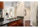Modern kitchen with granite countertops and stainless steel appliances at 325 E Paces Ferry Rd # 1110, Atlanta, GA 30305