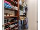 Well-organized walk-in closet with ample shelving and hanging space at 325 E Paces Ferry Rd # 1110, Atlanta, GA 30305