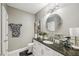 Modern bathroom with granite countertop and updated fixtures at 325 E Paces Ferry Ne Rd # Apt 710, Atlanta, GA 30305