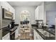 Modern kitchen with stainless steel appliances and granite countertops at 325 E Paces Ferry Ne Rd # Apt 710, Atlanta, GA 30305