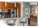 Modern kitchen with breakfast bar and granite countertop at 943 Peachtree Ne St # 1708, Atlanta, GA 30309
