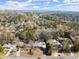 Aerial view showcasing home's curb appeal and neighborhood at 9465 River Lake Dr, Roswell, GA 30075