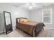 Bedroom with full-size bed, mirror, and large window at 1968 Drennon Ave, Austell, GA 30106