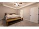 Main bedroom with ceiling fan and carpeted floor at 8162 Lakeview Pkwy, Villa Rica, GA 30180