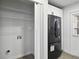 Convenient laundry area with shelving and hookups at 6630 Ramsgate Way, Norcross, GA 30093