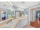 Elegant bathroom with double vanity and access to other rooms at 3275 Lenox Ne Rd # 206, Atlanta, GA 30324