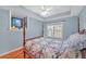 Bright bedroom with hardwood floors and a wooden bed frame at 3275 Lenox Ne Rd # 206, Atlanta, GA 30324