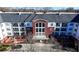 Brick building with a gray roof and multiple balconies at 3275 Lenox Ne Rd # 206, Atlanta, GA 30324