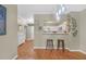 Dining area with hardwood floors and kitchen bar at 3275 Lenox Ne Rd # 206, Atlanta, GA 30324