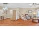 Living room with hardwood floors and massage chair at 3275 Lenox Ne Rd # 206, Atlanta, GA 30324