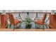 Two leather chairs and a plant create a comfortable seating area in this building's lobby at 3275 Lenox Ne Rd # 206, Atlanta, GA 30324