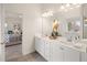 Double vanity bathroom with a view of the bedroom at 793 River Gardens Se Dr, Atlanta, GA 30354